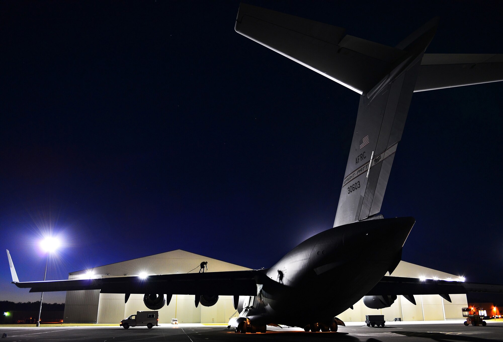 WRIGHT-PATTERSON AIR FORCE BASE, Ohio - Staff Sgt. Joshua Sharp, 445th Aircraft Maintenance Squadron, performs a post-flight inspection on a C-17 Globemaster III Sept. 5, 2013 at Wright Patterson Air Force Base, Ohio. Sharp inspects the aircraft for any defects that might prevent it from flying. (U.S. AIr Force photo/Tech. Sgt. Frank Oliver)