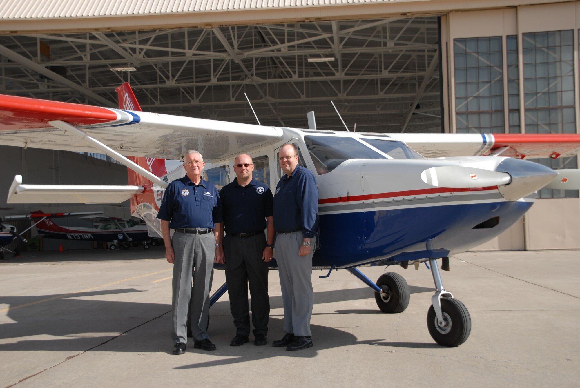 A Civil Air Patrol aircrew based at Kirtland AFB's Hanger 333 rescued a lost Army officer Nov. 13. Pictured left to right with the Gippsland Aero GA-8 they flew are Lt. Col. Ernie Braunschweig, 1st Lt. Tom Billstrand and 2nd Lt. Ryan Stark. (Photo by Capt. Ed Longoria)