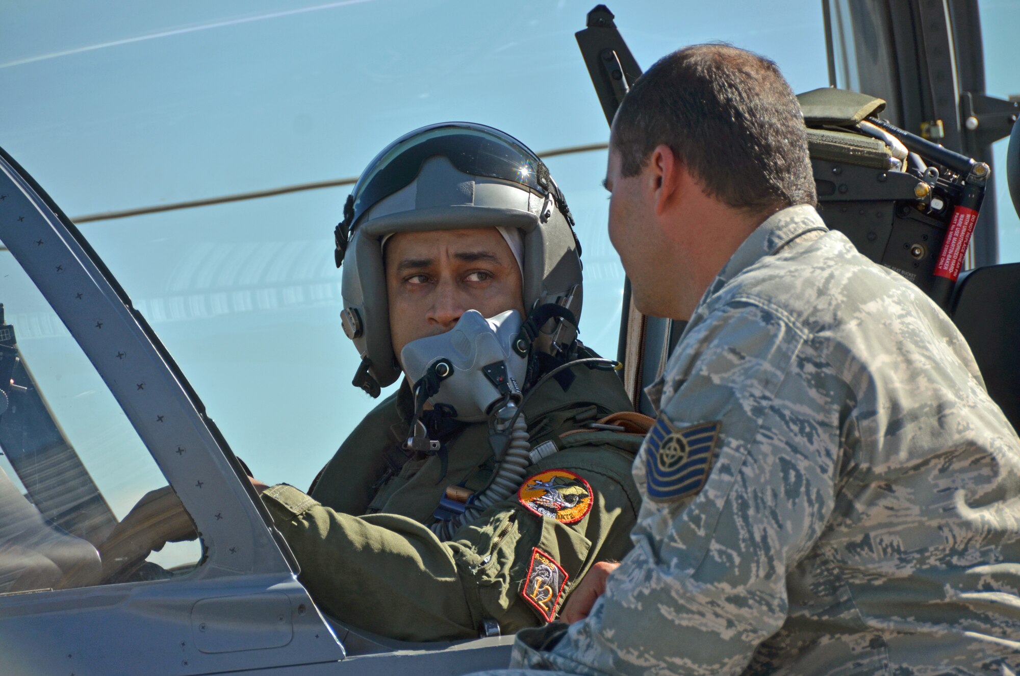 A Dominican Republic air force pilot and maintenance crew chief conduct pre-flight checks of an A-29 Super Tucano during an exercise to combat illegal drug trafficking over the skies of the Caribbean Dec. 3, 2013. The exercise is part of the Sovereign Skies Program, an initiative between the U.S., Colombian, and Dominican Republic air forces to share best-practices on procedures to detect, track and intercept illegal drugs moving north from South America. Since the program’s inception, the number of aircraft suspected to traffic drugs through the Dominican Republic dropped from more than 100 annually to nearly zero. (U.S. Air Force photo by Capt. Justin Brockhoff/Released)


