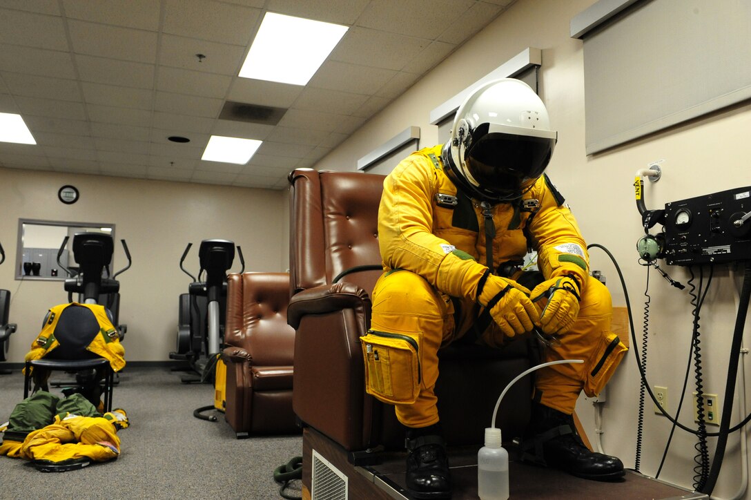Maj. Geoffrey, 1st Reconnaissance Squadron U-2 pilot, mentally prepares for his upcoming U-2 flight Dec. 3, 2013, at Beale Air Force Base Calif. U-2 pilots undergo a rigorous pre-flight schedule to ensure themselves and their full pressure suits are able to perform under extreme conditions during high altitude flights. (U.S. Air Force photo by Airman 1st Class Bobby Cummings/Released)