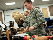 Airman 1st Class Mark Wheeler, Band of the West percussionist, rehearses for the upcoming Holiday in Blue concert, scheduled for Dec. 15 and 17 at Joint Base San Antonio-Lackland. Tickets are available at all three JBSA Information, Tickets and Tours locations. (U.S. Air Force photo by Benjamin Faske)