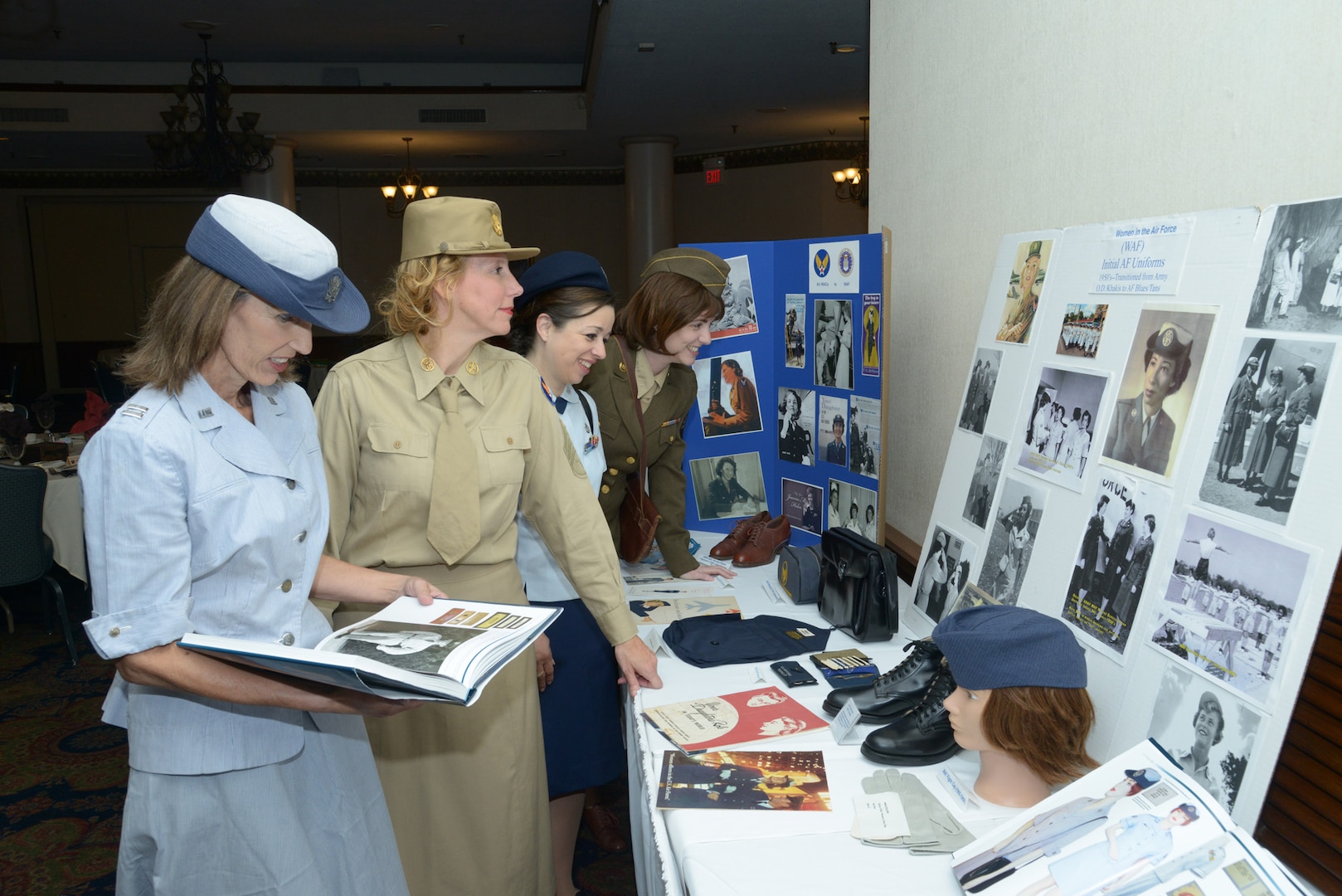 From left: Andrea Gindhart, Kim Kublie, Janet Lujan and Katie Bredeen observe a
display Nov. 21 during the Women of the Air Force event sponsored by the JBSARandolph
Officers' Spouses' Club at the JBSA-Randolph Parr Club. (U.S. Air Force photo by Joel Martinez)