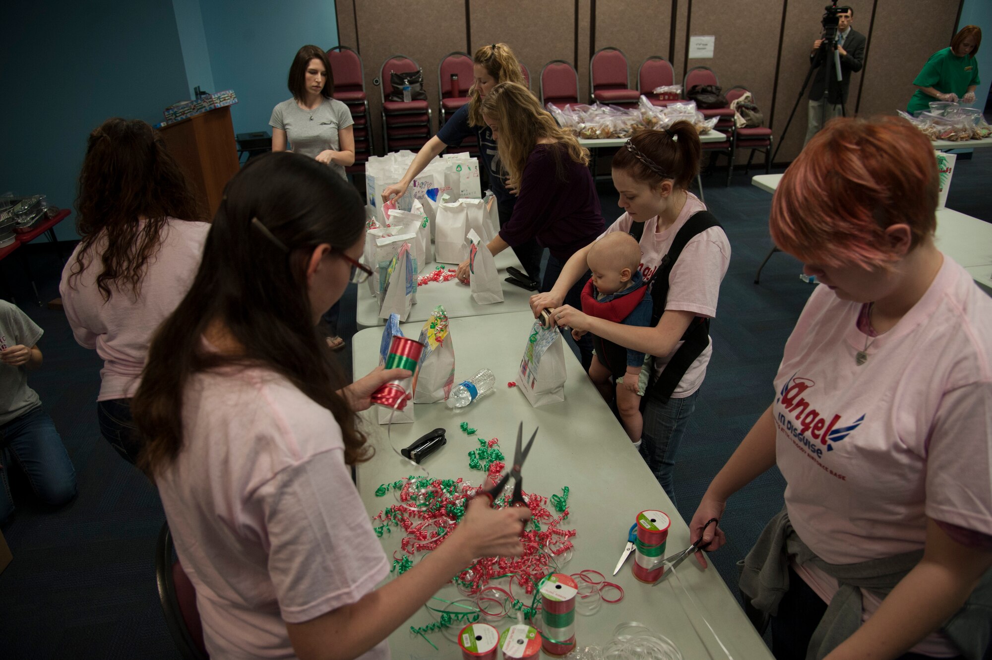 Military spouses package cookies for Airmen at Moody Air Force Base, Ga., Dec. 4, 2013. The cookie drive is meant for Airmen who may not get the chance to go home for the holidays. (U.S. Air Force Photo by Airman 1st Class Sandra Marrero/Released)
