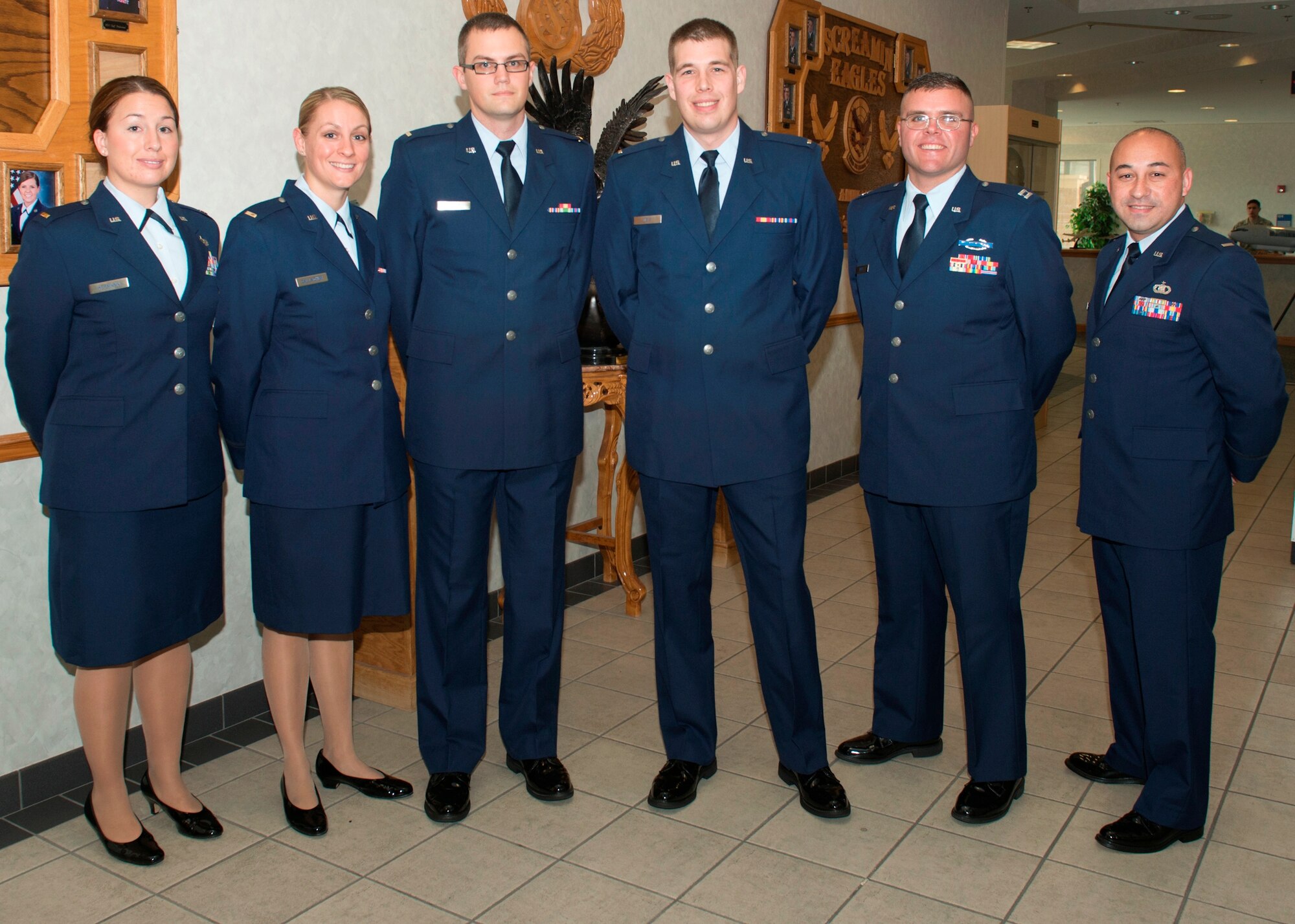 Seven Team Tyndall Airmen graduated from Undergraduate Air Battle Manager Class 14004 in a ceremony Dec. 4. (U.S. Air Force photo by Lisa Norman) 

