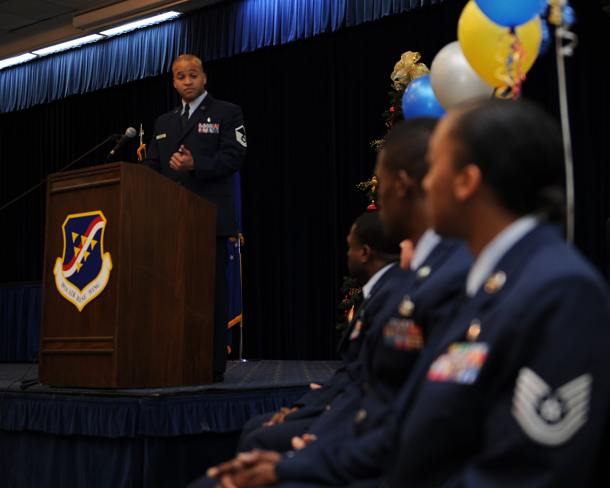 Master Sgt. Venton Horrice, 39th Medical Group medical quality manager, offers words of advice to Airmen about to receive their Community College of the Air Force associates degrees during a graduation ceremony Dec. 4, 2013, at Incirlik Air Base, Turkey. Twelve Airmen received their CCAF degree at the ceremony. (U.S. Air Force photo by Senior Airman Chase Hedrick/Released)