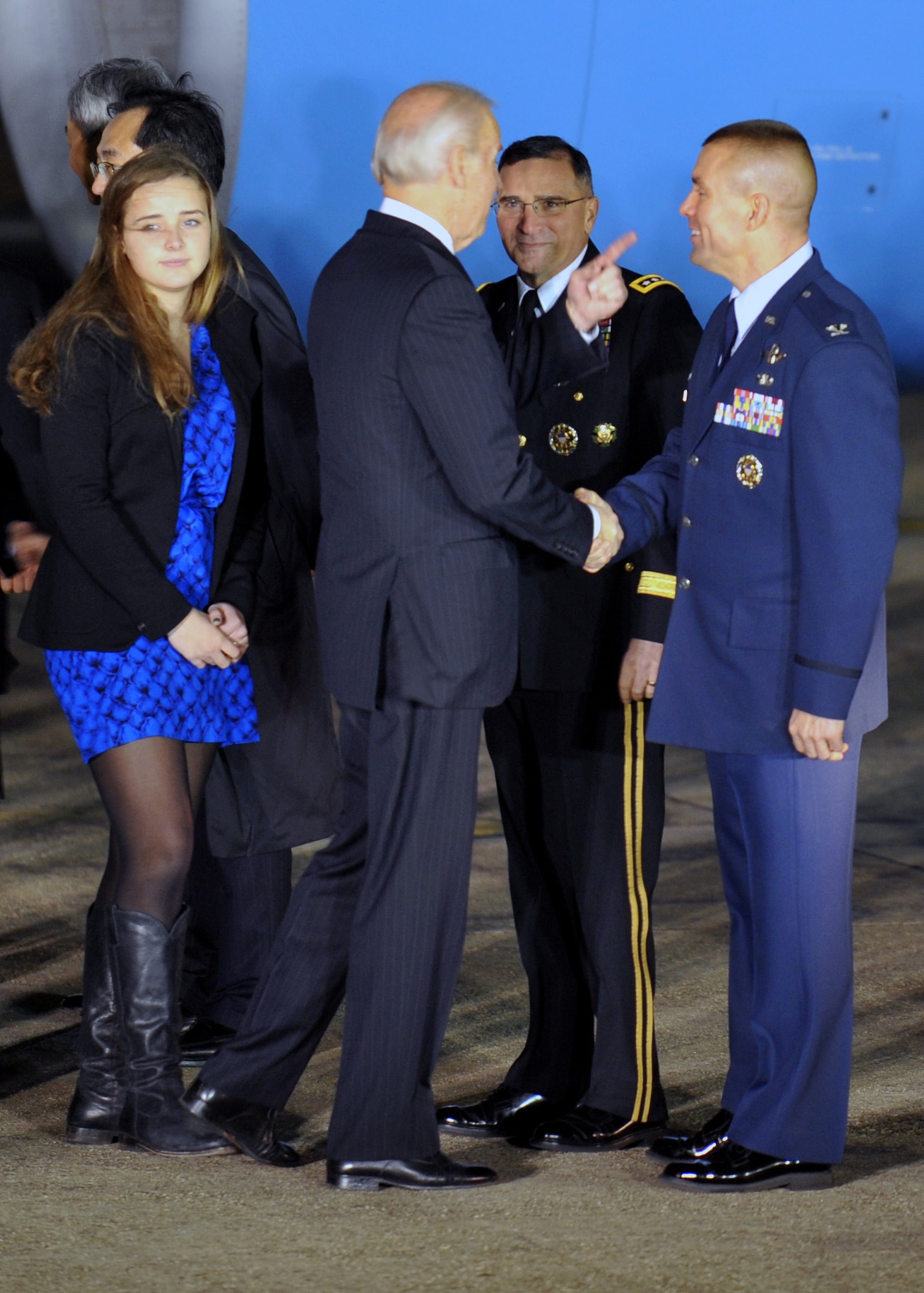 U.S. Vice President Joe Biden coins Col. Brook Leonard, 51st Fighter Wing commander, after arriving at Osan Air Base, Republic of Korea, Dec. 5, 2013. Biden, who was on his way to Seoul to meet with South Korean President Park Geun-hye, also met with officials from Japan and China during his visit to Asia. (U.S. Air Force photo/Senior Airman Siuta B. Ika)