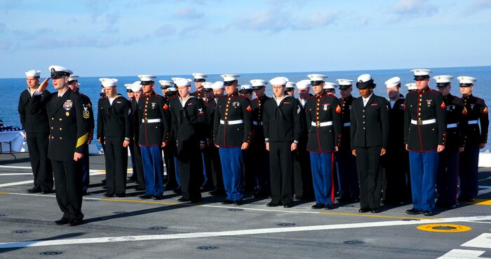 USS NEW YORK - Marines and Sailors pay tribute to 20 Marines and Sailors during a burial-at-sea ceremony on Dec. 5, 2013, aboard USS New York as it heads to its new homeport, Jacksonville, Fla. Among those honored, some served as far back as World War II and as recent as the Global War on Terrorism. Read the story at the following link: http://www.dvidshub.net/news/117821/uss-new-york-changes-home-ports. 