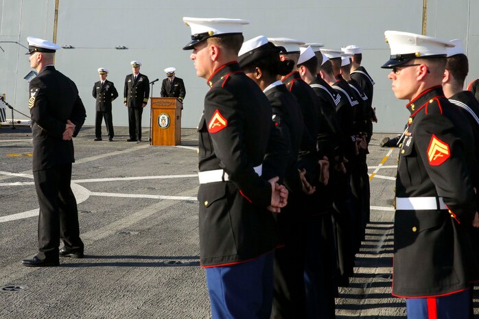 USS NEW YORK - Marines and Sailors pay tribute to 20 Marines and Sailors during a burial-at-sea ceremony aboard USS New York on Dec. 5, 2013, as the ship heads to its new home port, Jacksonville, Fla. Among those honored, some served as far back as World War II and others as recently as the Global War on Terrorism. Visit the following link to read the story about the home port change: http://www.dvidshub.net/news/117821/uss-new-york-changes-home-ports.