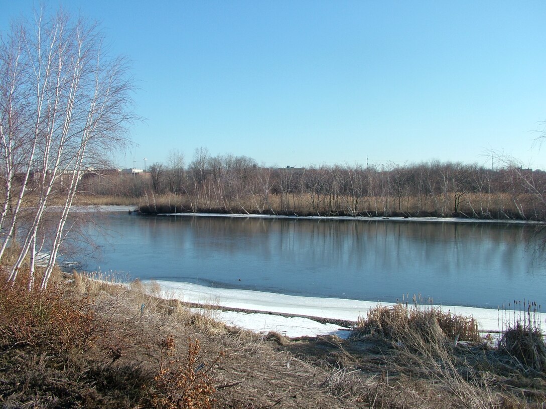 Looking east across the Malden River towards the northernmost island, the north end of the oxbow and the Everett shore. The purpose of the  Malden River Ecosystem Restoration Project is to restore river ecosystem to the highest quality with three primary restoration objectives: wetlands restoration, aquatic habitat restoration and riverine migratory restoration.