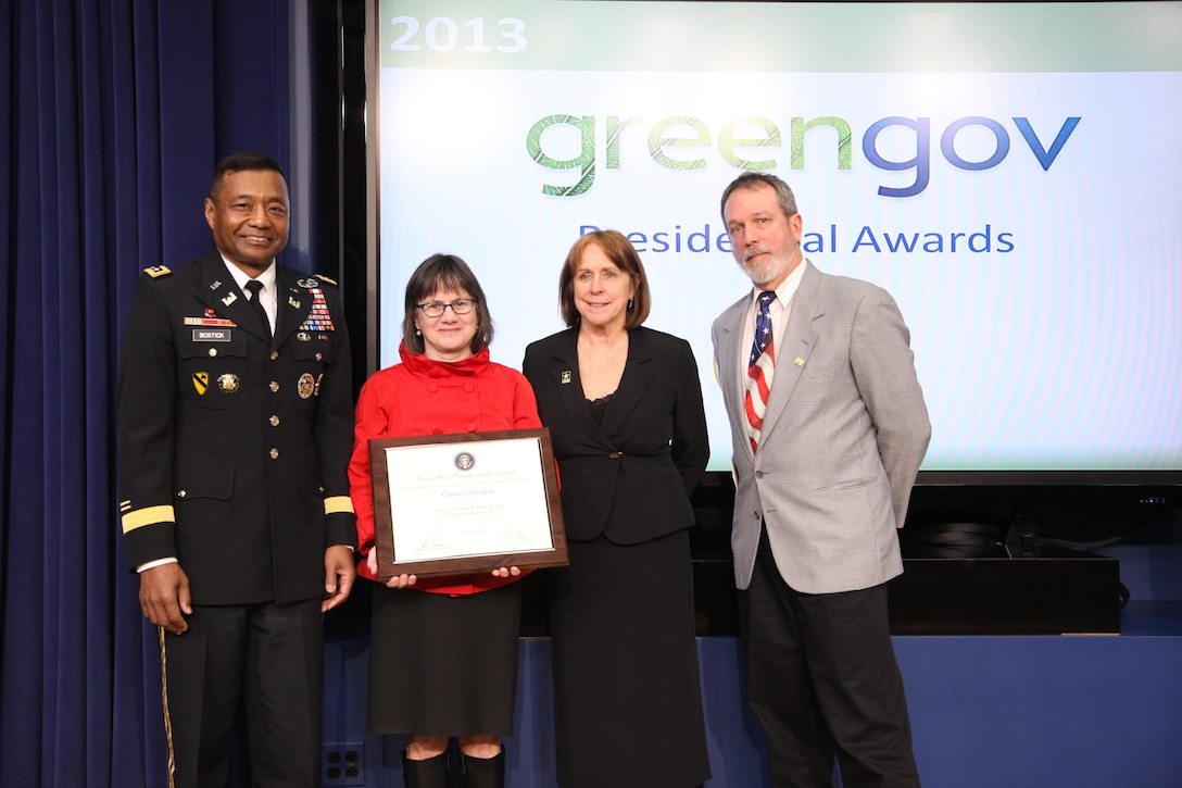 IWR Climate and Global Change team lead Kathleen D. White, PhD, PE, was part of a team recognized  a 2013 GreenGov Presidential Awards. The team was recognized for developing the Sea Level Rise Tool for Sandy Recovery, which is now being used in New York and New Jersey where planning and rebuilding is underway.  Left to right: Lieutenant General Thomas P. Bostick (USACE Commanding General and Chief of Engineers), Honorable Jo-Ellen Darcy (Assistant Secretary of the Army (Civil Works)), Kathleen D. White (USACE Institute for Water Resources), Mark Huber (USACE Army Geospatial Center).