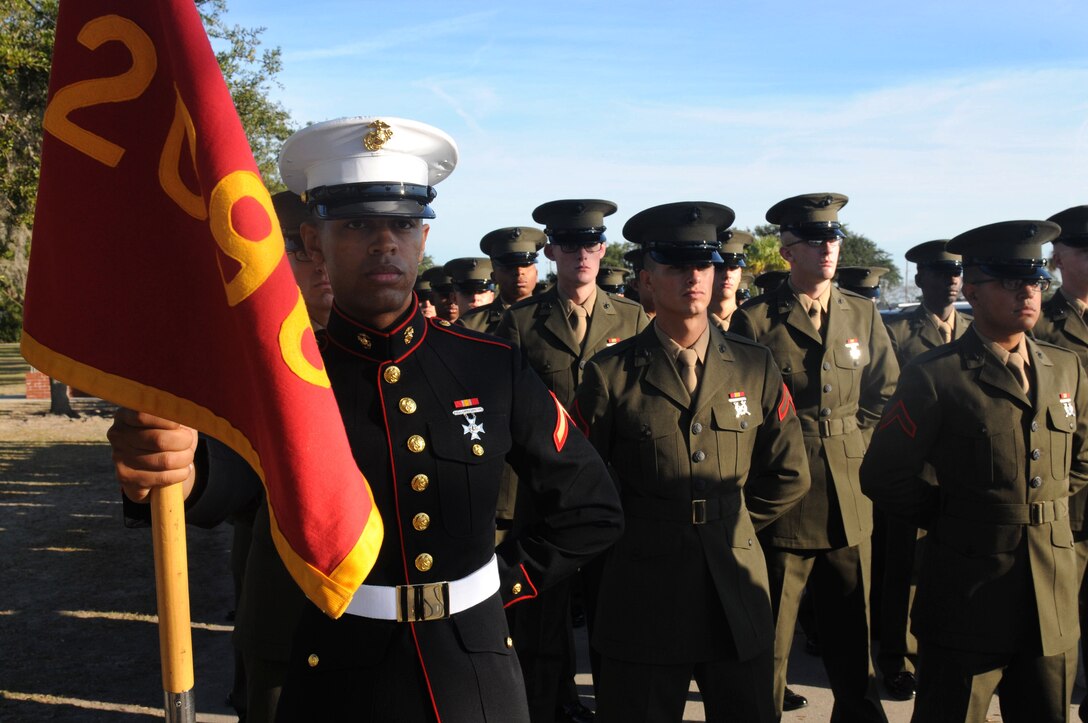 PARRIS ISLAND - S.C. - Pfc. Adame C. Clayton, honor graduate for platoon 2096, stands at parade rest before graduation aboard Parris Island, S.C., Dec. 6, 2013. Clayton, a native of Jacksonville, Fla., was recruited by Sgt. Catherine Light, a recruiter from Recruiting Substation Jacksonville Beach, Recruiting Station Jacksonville. Clayton will be able to enjoy some much deserved leave with his family as he prepares for Marine combat training in Camp Geiger, N.C. (U.S. Marine Corps photo by Lance Cpl. Stanley Cao)