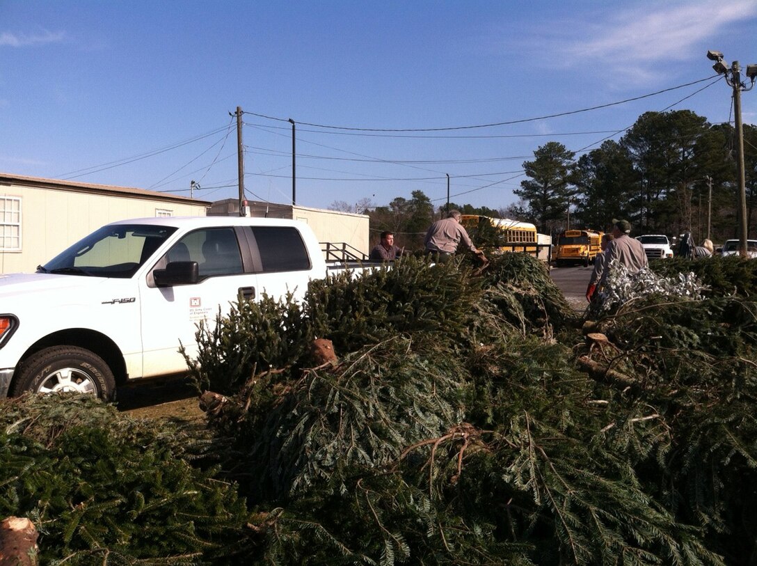 Volunteers collect used Christmas trees at Riverside Middle School during the U.S. Army Corps of Engineers annual tree recycling program at J. Strom Thurmond Lake, January 2013.