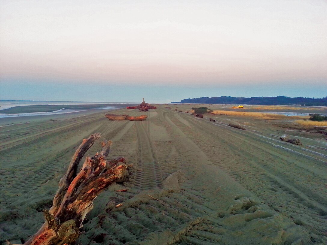 The U.S. Army Corps of Engineers, Seattle District, recently completed a $7.5 million federally-funded dune restoration project to provide coastal storm damage protection and prevent wetland erosion in Willapa Bay near the Shoalwater Bay Indian Reservation.

Repair work included dredging approximately 700,000 cubic yards of sand from a borrow site about 3,000 feet offshore, providing materials to rebuild the 12,500 foot-long protective berm up to 25 feet tall.  

In addition to mitigating flood risks and preserving Native American cultural lands, the project also improved habitat for the Pacific Coast western snowy plover, a small shorebird federally listed under the Endangered Species Act as threatened.  
