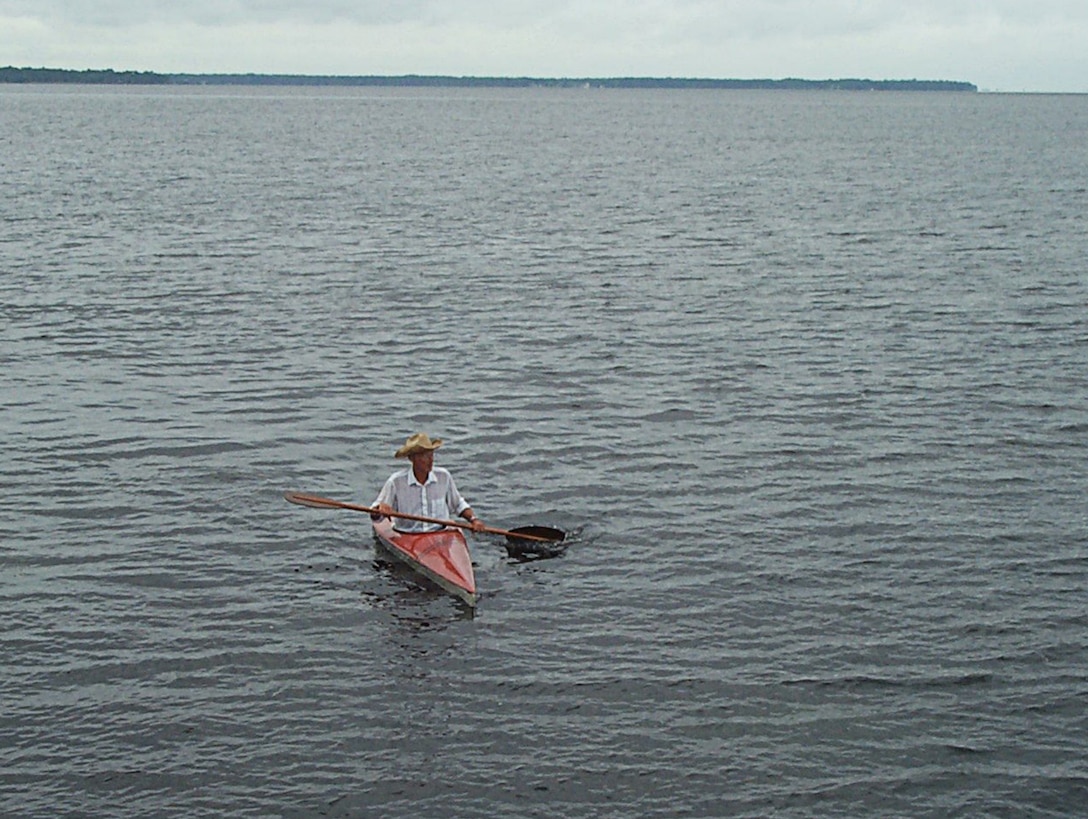 Noble Enge “at home” in his beloved kayak during a 10-mile freshwater trip from the Shands Bridge to his house in Switzerland on the St. Johns River in 2003.