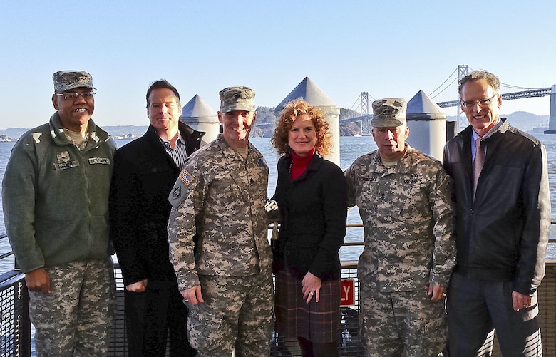 Maj. Gen. Todd T. Semonite, Deputy Chief of the U.S. Army Corps of Engineers, Brig. Gen. C. David Turner, South Pacific Division commander and Lt. Col. John Baker, San Francisco District commander join Ms. Monique Moyer, Executive Director of the Port of San Francisco (center) aboard the USACE debris removal vessel John A.B. Dilliard Thursday, Dec. 6, 2013 in San Francisco, Calif. The San Francisco District’s floating debris hazard collection work performed by the crew of the Dillard, based out of the District’s Sausalito Base Yard facility, ranges far and wide patrolling for debris in bay waters, removing a total of about 90 tons a month.