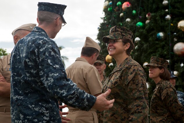 Rear Adm. Margaret Kibben (right), Chaplain of the Marine Corps, and native of Warrington, Penn., speaks with a sailor during a meet and greet at the Chaplain Joseph W. Estabrook Chapel aboard Marine Corps Base Hawaii, Dec. 2, 2013. Kibben was appointed as the 18th Chaplain of the Marine Corps in 2010 also the first female to do so. (U.S. Marine Corps photo by Lance Cpl. Matthew Bragg)