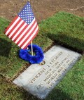 The gravestone of Cpl. Vincent J. Kechner, killed at Hickam Field during the Dec. 7th, 1941 attacks on Oahu military installations, Dec. 6, 2013, at the National Memorial Cemetery of the Pacific. Four representatives from the 15th Medical Group, including Col. Virginia Garner, 15th MDG commander, visited the cemetery to pay respects to Kechner, one of their medical field comrades. Kechner was scheduled to depart the island the day after the attacks. The 72nd Remembrance Ceremony commemorating the attack on Hickam Field is Dec. 7 and begins at 7:55 a.m. at the Hickam Field Flag Pole. (U.S. Air Force photo/Staff Sgt. Alex Martinez)