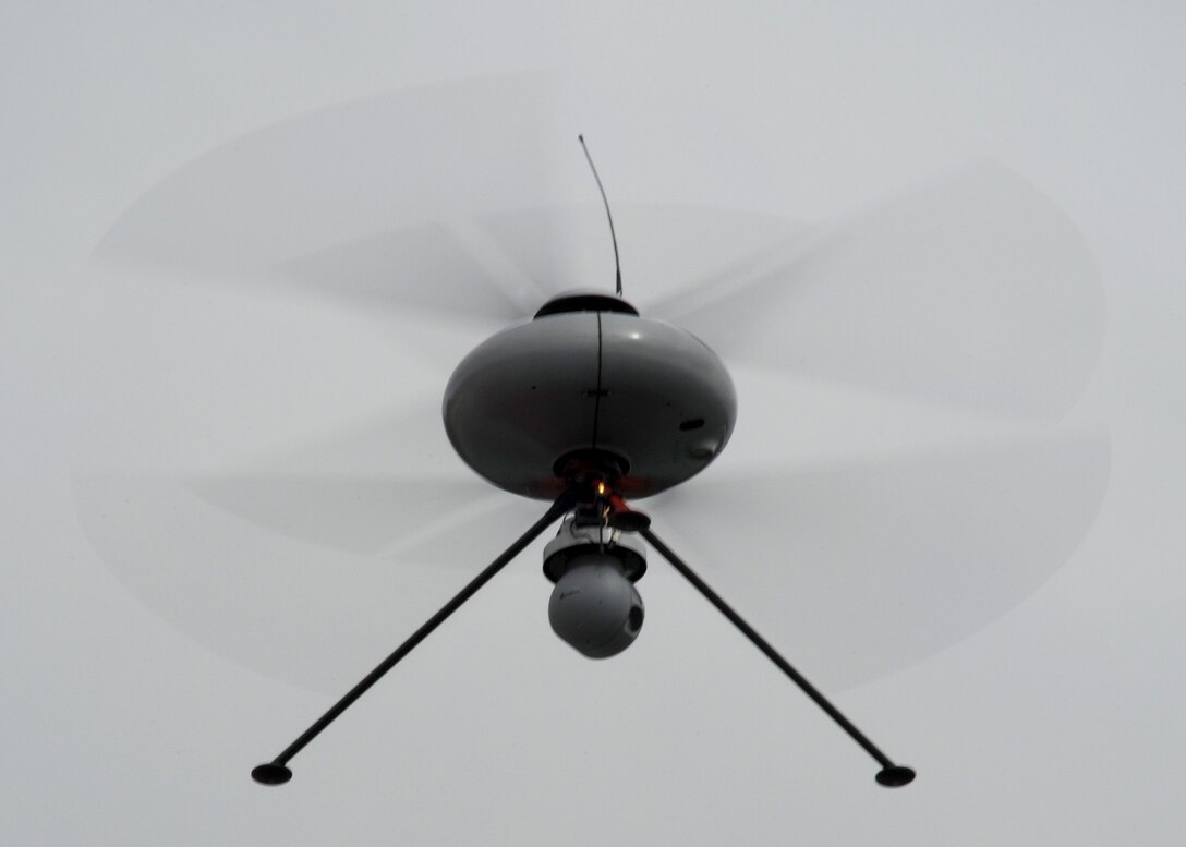 A French unmanned aerial vehicle hovers in front of an assembled crowd during an aerial demonstration at the fourth biennial Brunei Darussalam International Defense Exhibition at the BRIDEX Exhibition Center in Bandar Seri Begawan, Brunei, Dec. 5, 2013. The five-day event includes displays and demonstrations of military equipment, with the theme of bridging the capability gap. BRIDEX 13 is an opportunity for communication and cooperation with regional partners and allies, builds strong multilateral relationships and enhances preparedness for disasters and other contingency operations. (U.S. Air Force photo/Master Sgt. Jerome S. Tayborn)