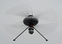 A French unmanned aerial vehicle hovers in front of an assembled crowd during an aerial demonstration at the fourth biennial Brunei Darussalam International Defense Exhibition at the BRIDEX Exhibition Center in Bandar Seri Begawan, Brunei, Dec. 5, 2013. The five-day event includes displays and demonstrations of military equipment, with the theme of bridging the capability gap. BRIDEX 13 is an opportunity for communication and cooperation with regional partners and allies, builds strong multilateral relationships and enhances preparedness for disasters and other contingency operations. (U.S. Air Force photo/Master Sgt. Jerome S. Tayborn)