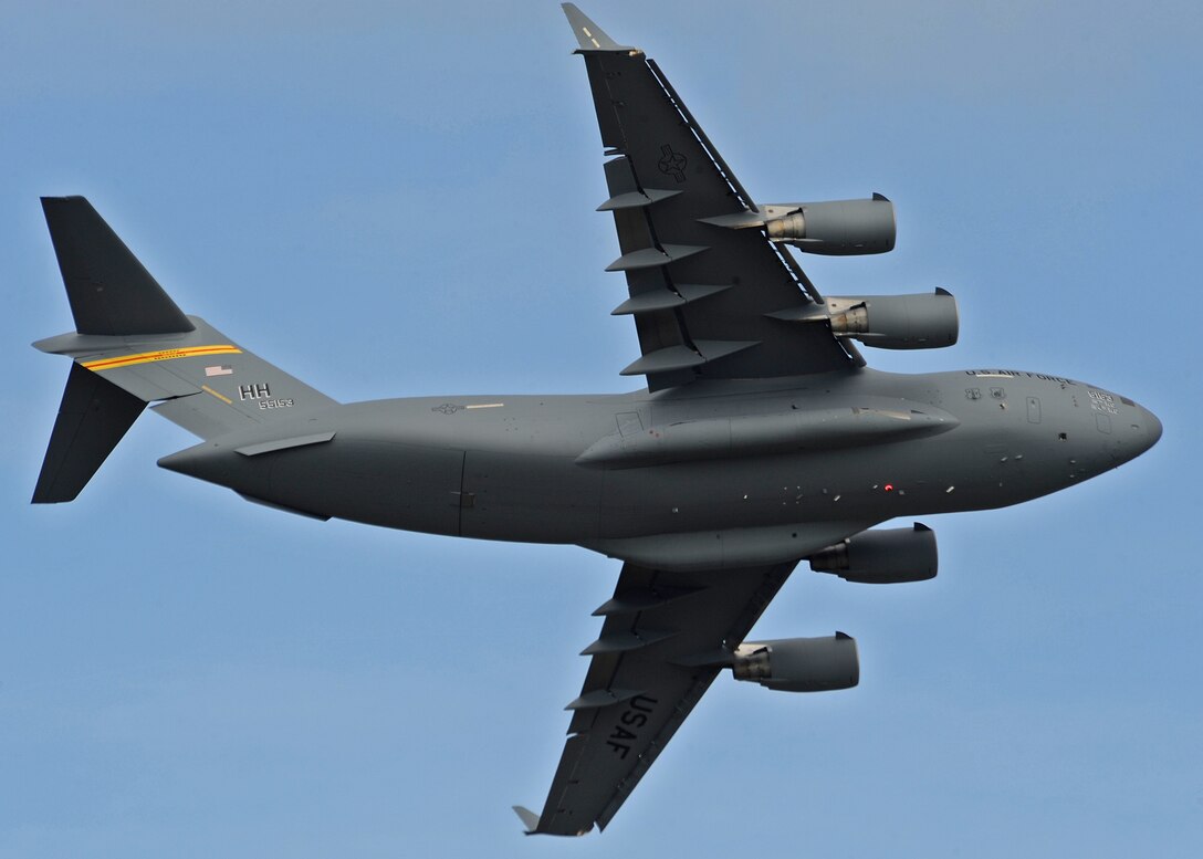 A C-17 Globemaster III demonstrates a hard left banking turn during the fourth biennial Brunei Darussalam International Defense Exhibition at the BRIDEX Exhibition Center in Bandar Seri Begawan, Brunei, Dec. 5, 2013. BRIDEX 13 is a five-day event compromised of social events, displays and demonstrations. BRIDEX 13 is an opportunity for networking and sharing technology with regional partners and allies which builds strong multilateral relationships, increases cooperation and enhances preparedness for disasters and other contingency operations. (U.S. Air Force photo/Master Sgt. Jerome S. Tayborn)
