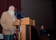 First Lt. (Ret.) Paul Kniss briefly addresses the crowd who attended his Purple Heart medal and Prisoner of War medal presentation ceremony in the F.E. Warren Air Force Base, Wyo., Theater Dec. 5, 2013. (U.S. Air Force photo by Airman 1st Class Jason Wiese)