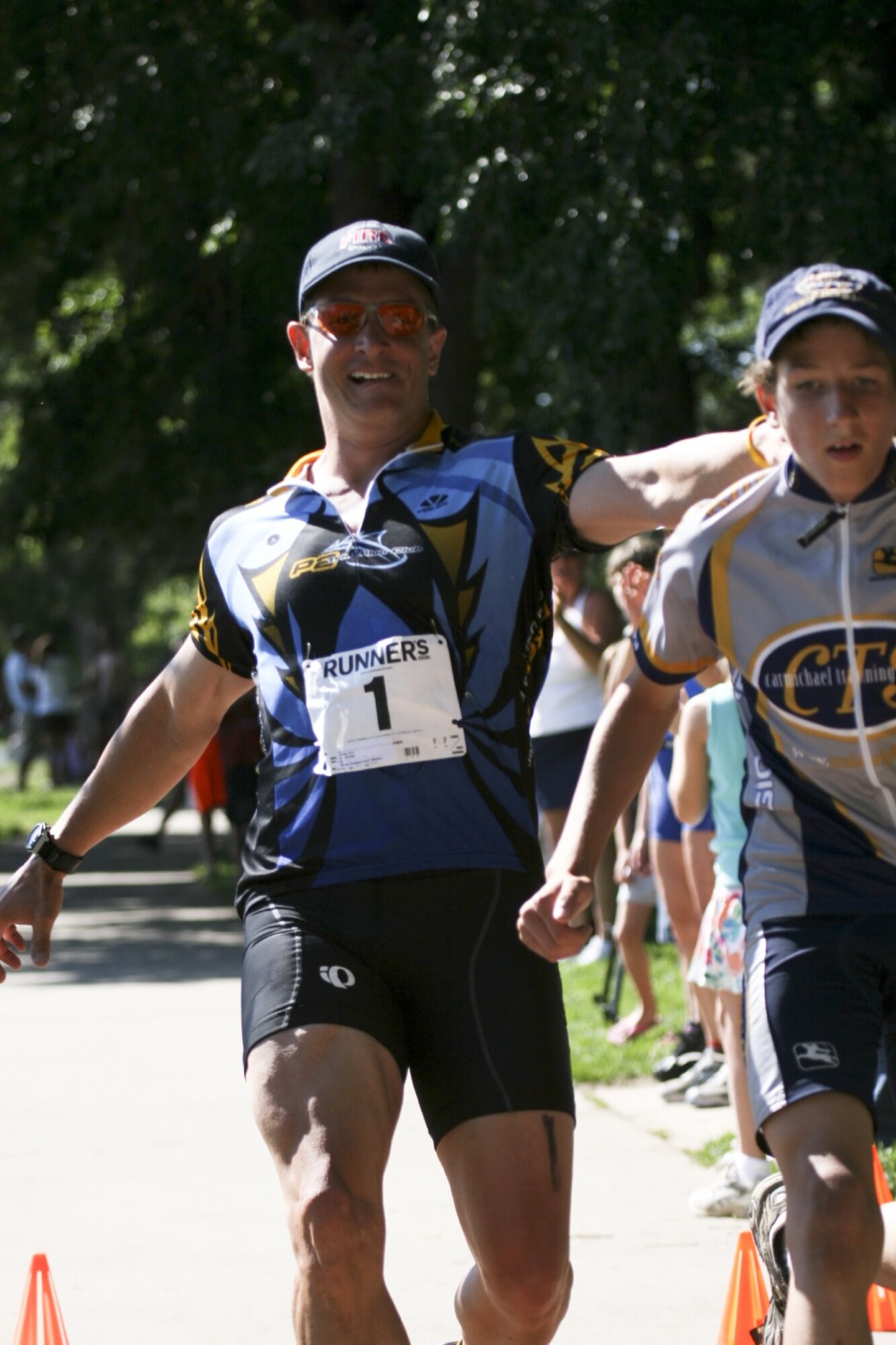 Capt. Eric Miller, 140th Medical Group, Colorado Air National Guard, began participating in triathlons with his son, Garrett, who was left visually impaired after he underwent surgery for a medulloblastoma malignant brain tumor at the age of five. (Photo courtesy of Capt. Eric Miller)