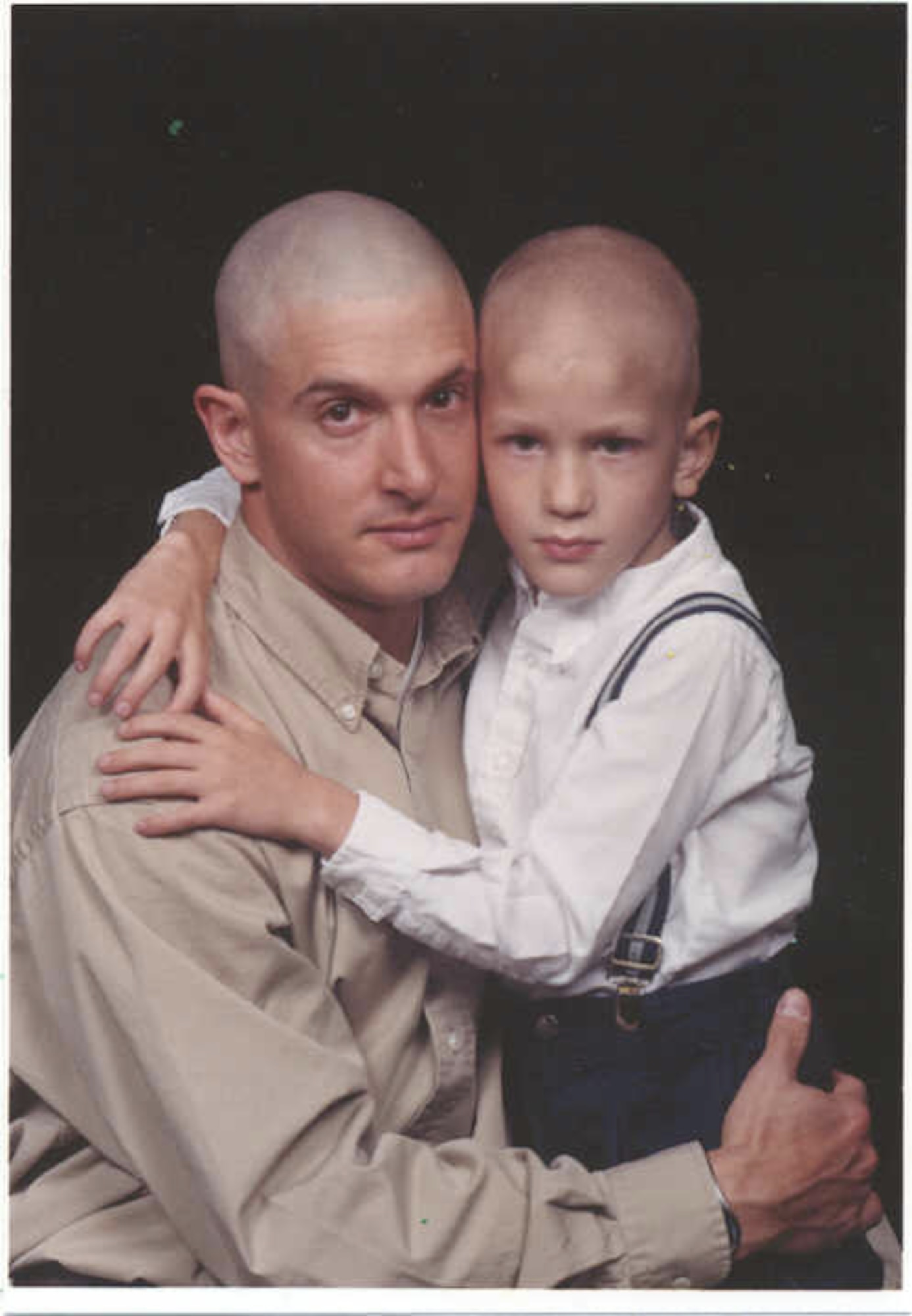 Capt. Eric Miller, 140th Medical Group, Colorado Air National Guard, with his son, Garrett, after he was diagnosed with a medulloblastoma malignant brain tumor at the age of five. (Photo courtesy of Capt. Eric Miller)