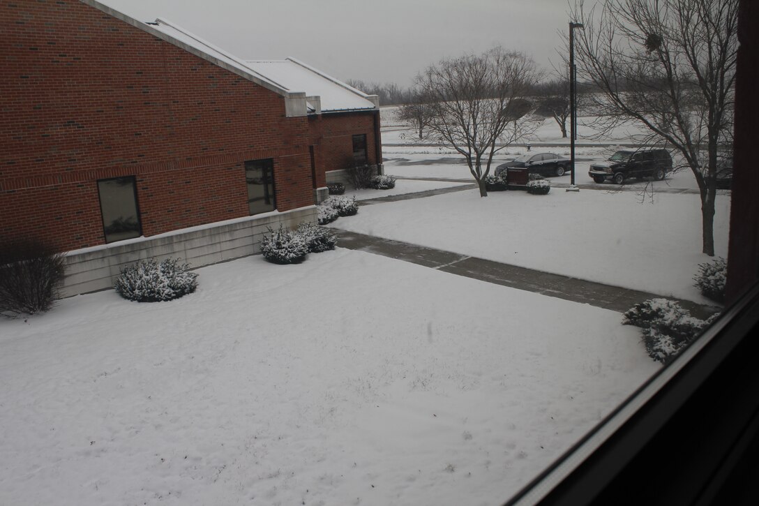 The first big snowstorm of the season caused delayed reporting at the 932nd Airlift Wing today.  In accordance with Scott Air Force Base Instruction 90-101, Severe Weather Operations, "The purpose for delayed reporting during hazardous weather conditions is to allow base personnel additional time for safe travel to the base. Delayed reporting applies to military and civilian personnel; leave will not be charged."  The commander has recently clarified that delayed reporting is just that ... delayed reporting. Please allow time for the roads and parking areas to be cleared.  Members are not expected to be at work until the delayed report time. The base commander will determine the delay conditions.

Information about future base operating procedures in the event of inclement weather will be released through the public website, the Straight Talk Line at 256-SAFB (7232), the Scott AFB Facebook page (which is a direct link off of www.scott.af.mil), and  base-wide e-mails (for early release only). The Team Scott community is highly encouraged to check these sources first.  (U.S. Air Force photo/Maj. Stan Paregien)