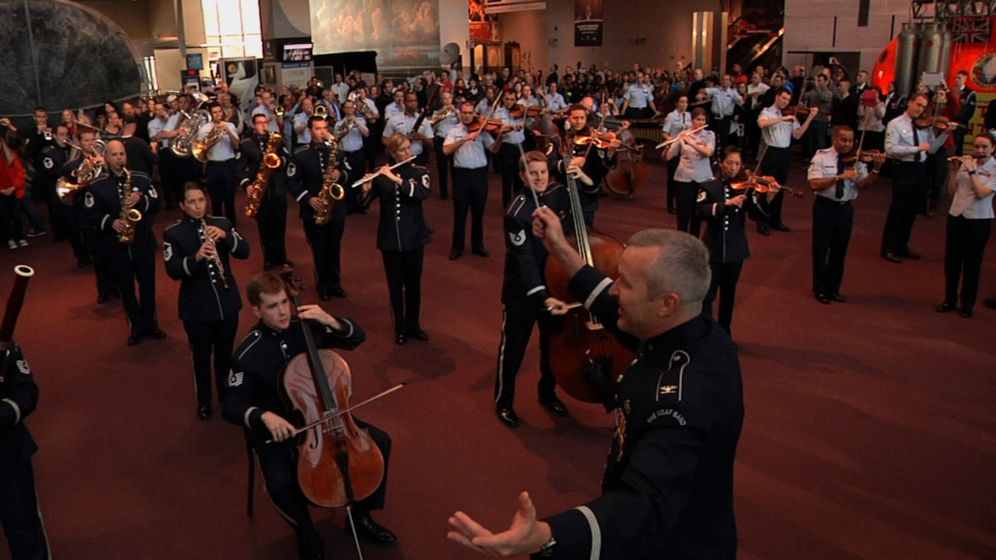 Col. Larry H. Lang conducts the Band's first-ever flash mob at the National
Air and Space museum to kick off our holiday concert season (U.S. Air Force photo photo/released)
