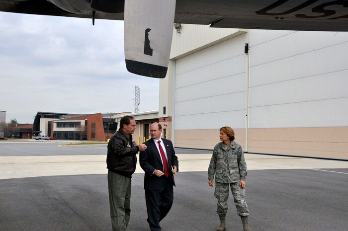 U.S. Air Force Col. Mike Feeley, commander, 166th Airlift Wing, U.S. Sen. Chris Coons (D-Del.) and U.S. Air Force Brig. Gen. Carol Timmons, assistant adjutant general for air, Delaware National Guard, discuss the operations of the Delaware Air National Guard C-130H following a tour of the aircraft on Dec. 2, 2013 at the New Castle ANG Base, Del. (U.S. Army National Guard photo by Staff Sgt. Wendy McDougall)
