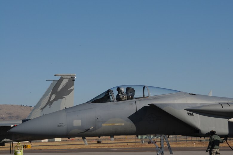 Two F-15Cs from the 144th Fighter Wing, Fresno, Calif., prepare to shutdown engines at Kingsley Field Dec. 4, 2013. The 173rd Fighter Wing is teaming up with the 144th to increase the number of students trained in order to meet an increased demand for F-15 pilots at the 144th. (U.S. Air National Guard photo by Master Sgt. Jennifer Shirar/released)