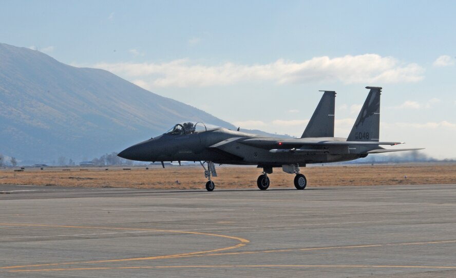 The first F-15C from the 144th Fighter Wing, Fresno, Calif., lands at Kingsley Field Dec. 4, 2013. The 173rd Fighter Wing is teaming up with the 144th to increase the number of students trained in order to meet an increased demand for F-15 pilots at the 144th. (U.S. Air National Guard photo by Master Sgt. Jennifer Shirar/released)