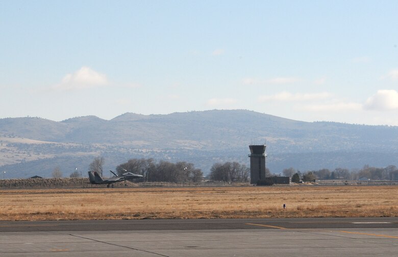 The first F-15C from the 144th Fighter Wing, Fresno, Calif., lands at Kingsley Field Dec. 4, 2013. The 173rd Fighter Wing is teaming up with the 144th to increase the number of students trained in order to meet an increased demand for F-15 pilots at the 144th. (U.S. Air National Guard photo by Master Sgt. Jennifer Shirar/released)