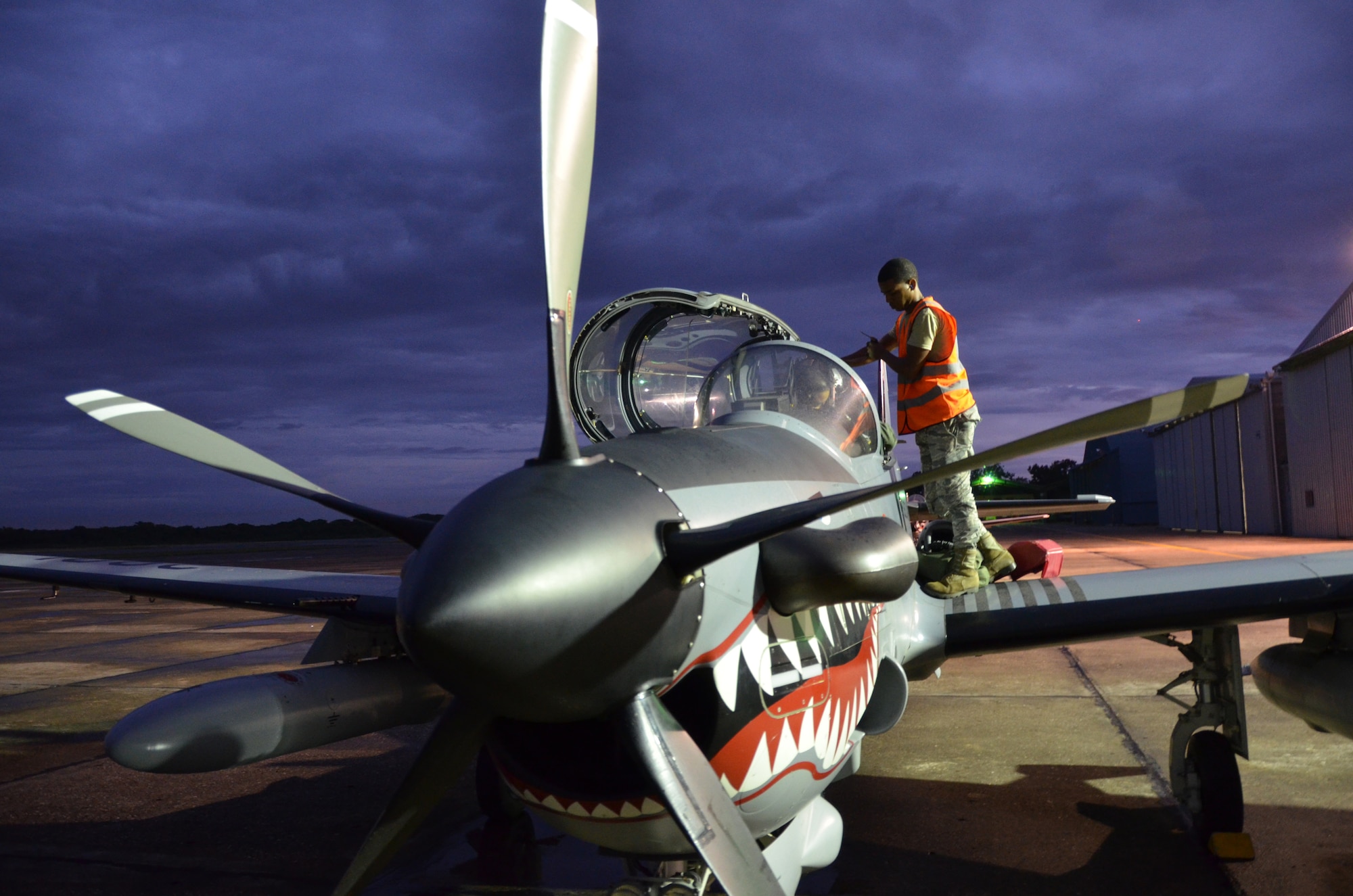 Dominican Republic air force airmen prepare for a nighttime flight as part of an exercise to detect and track illegal drug traffic Dec. 4, 2013. The exercise is part of the Sovereign Skies Program, an initiative between the U.S., Colombian, and Dominican Republic air forces to share best-practices on procedures to detect, track and intercept illegal drugs moving north from South America. Since the program’s inception, the number of aircraft suspected to traffic drugs through the Dominican Republic dropped from more than 100 annually to nearly zero. (U.S. Air Force photo by Capt. Justin Brockhoff/Released)


