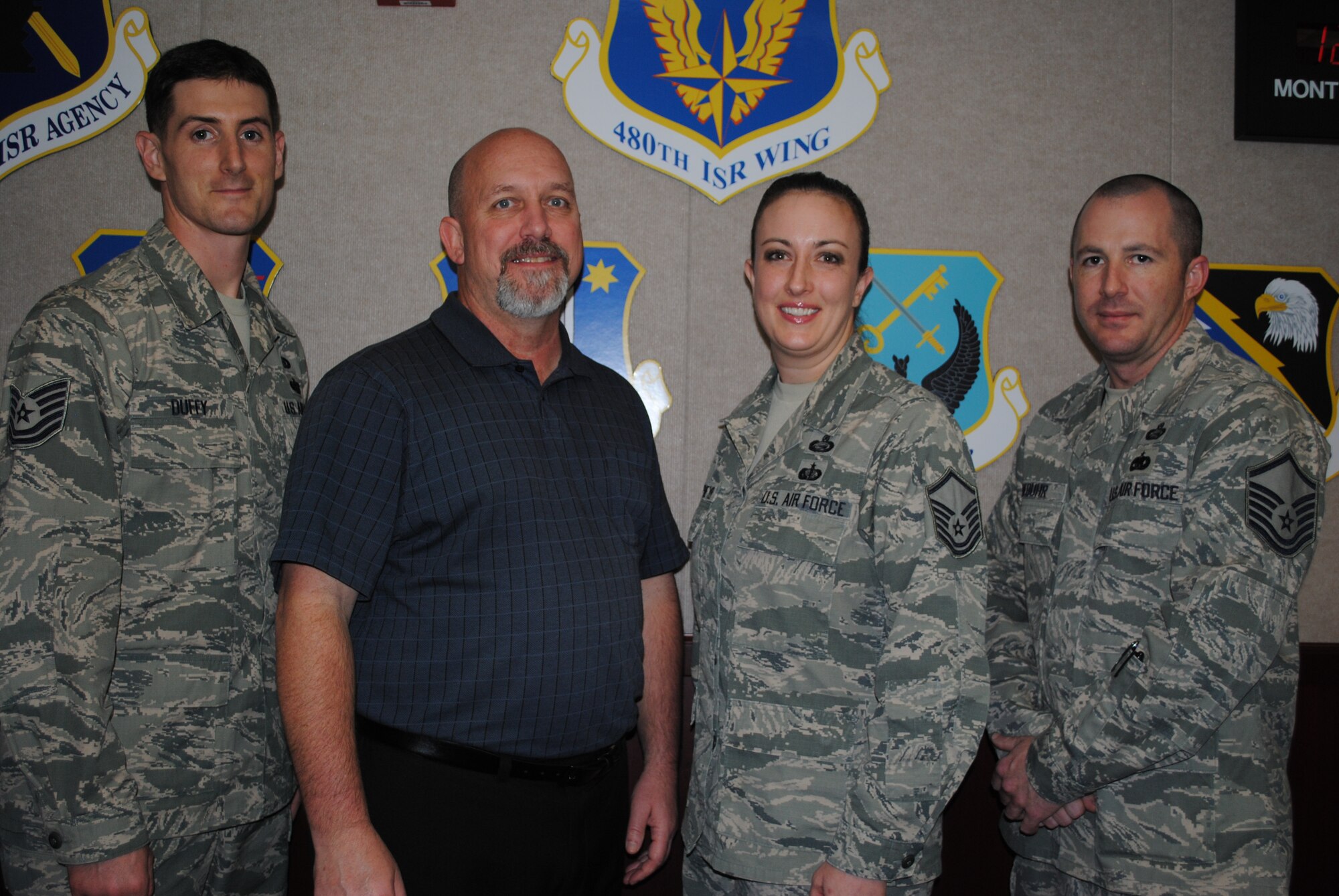 480th Intelligence, Surveillance and Reconnaissance Wing Manpower and Organization Office members, left to right, Tech. Sgt. Shaun Duffy, Mr. Ed Banaszek, Master Sgt. Rhonda Knipmeyer and Master Sgt. Russell Niebuhr were recognized by the Air Force District of Washington for having the best program in 2013. Knipmeyer also won the General Billy J. Boles Mentorship Award for leadership skills. (U.S. Air Force photo by Marge McGlinn)