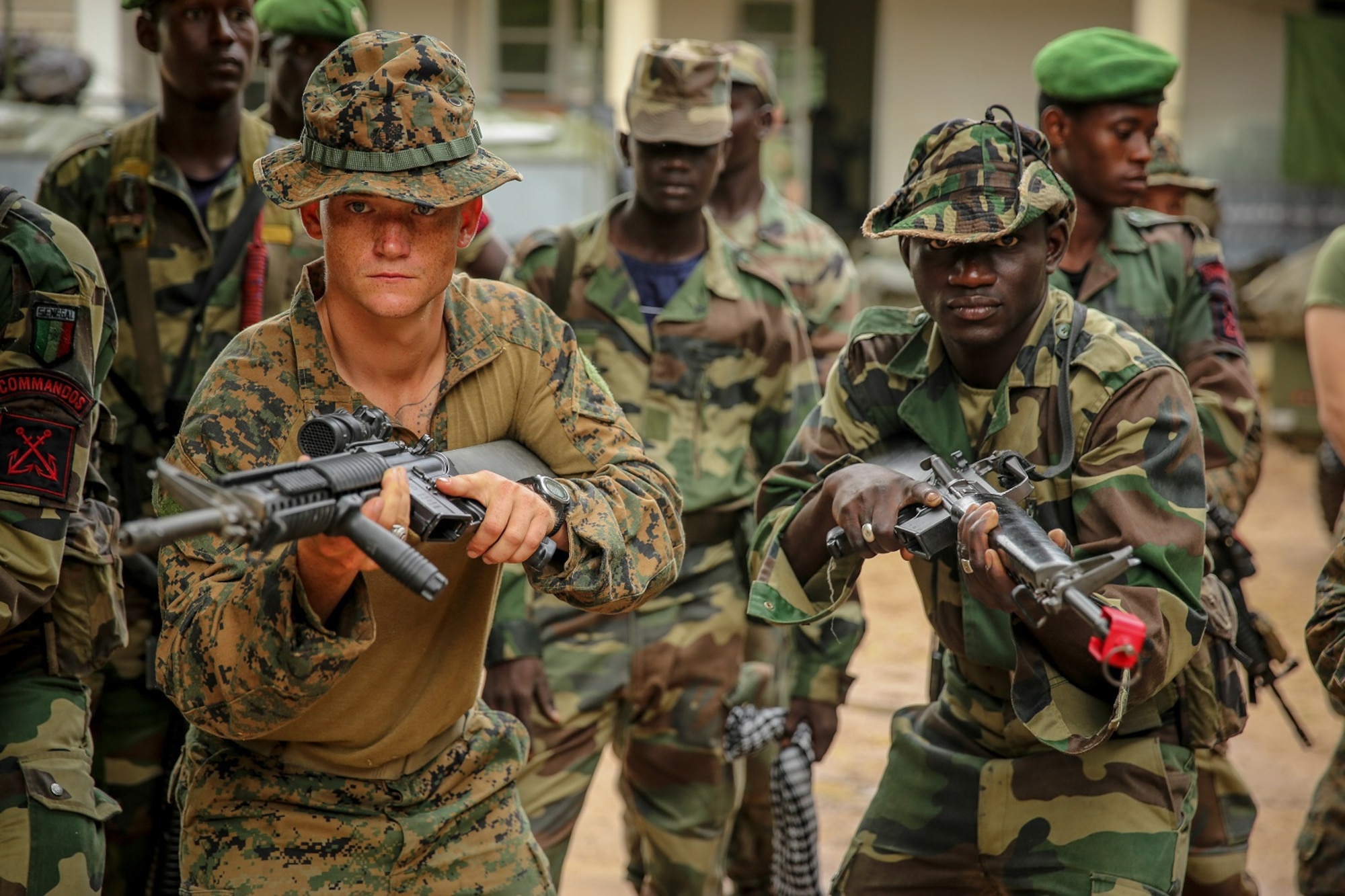 Senegalese Companie de Fusilier Marine commandos and U.S. Marines conduct Marine Corps martial arts training Sept. 18, 2013. The U.S. Marines and Sailors of Africa Partnership Station 13 recently completed a weeklong engagement with Senegalese Companie de Fusilier Marine commandos to further promote maritime security and partnership in the area. Africa Partnership Station is a combined exercise between U.S., Dutch, Spanish, British Marines and their African partners that strengthens partnerships to improve safety and security both at sea and ashore, working together for a shared common goal that helps foster mutual trust and understanding. (U.S. Marine Corps photo by Sgt. Marco Mancha)