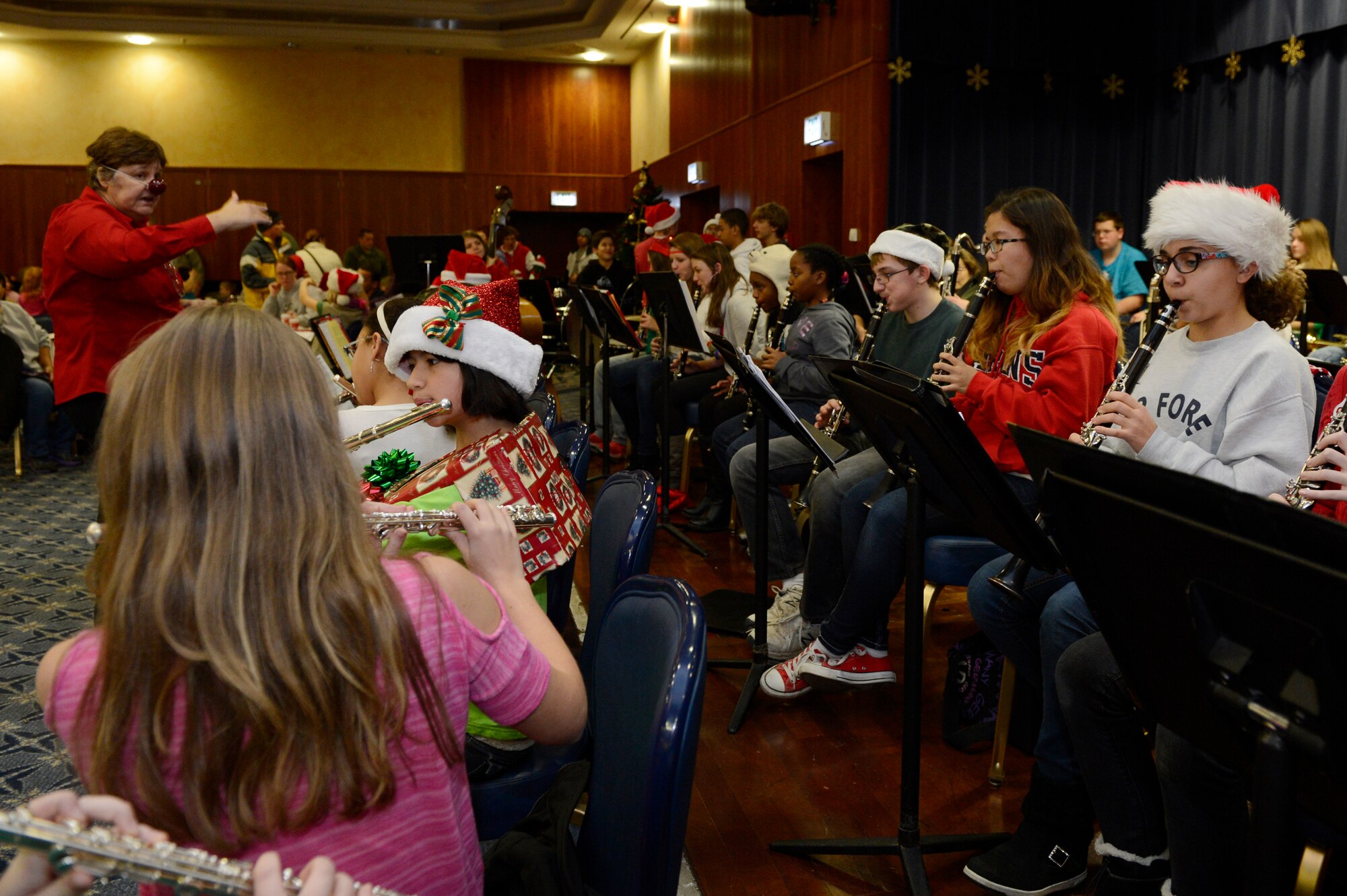SPANGDAHLEM AIR BASE, Germany – The Bitburg High School Band plays holiday music at Club Eifel during a tree lighting ceremony Dec. 5, 2013. The ceremony included entertainment from local bands, Girl Scouts and dance performers.  (U.S. Air Force photo by Staff Sgt. Christopher Ruano/Released)