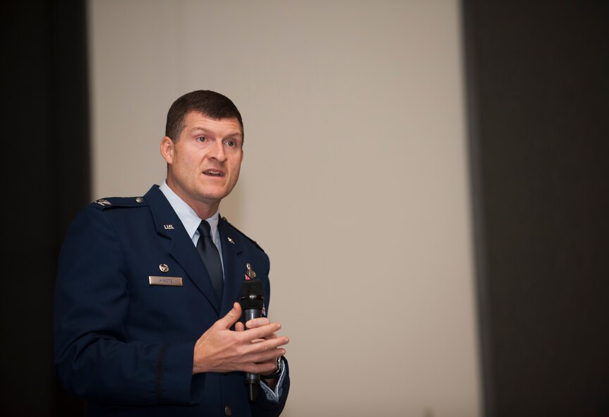 Col. S. Clinton Hinote, 8th Fighter Wing commander, speaks to Airmen during a sexual assault prevention and response all call at Kunsan Air Base, Republic of Korea, Dec. 6, 2013. Hinote held six nontraditional all calls featuring a Sexual Assault Theater Group performance, SAPR training and a question and answer session, as part of a continuing effort to combat sexual assault and promote a culture change. (U.S. Air Force photo by Senior Airman Armando A. Schwier-Morales/Released)