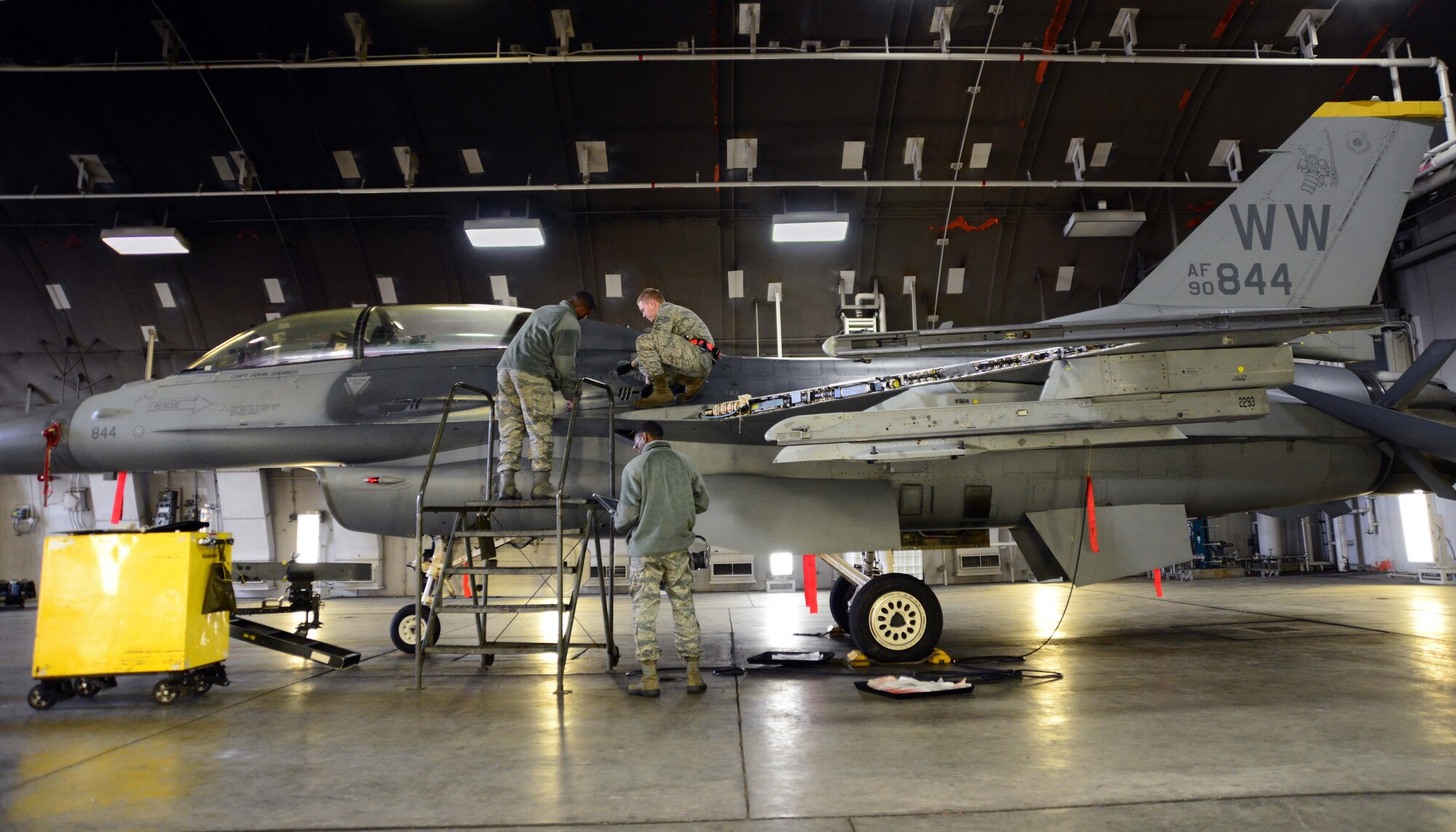 Maintainers from the 35th Aircraft Maintenance Squadron work on an F-16 Fighting Falcon assigned to the 14th Fighter Squadron at Misawa Air Base, Japan, Dec. 6, 2013. The 35 AMXS provides support for the 13th and 14th Fighter Squadrons, which cumulatively contain 44 jets that support the 35th Fighter Wing’s mission of Suppression of Enemy Air Defenses. Maintainers are always present when flying operations are conducted throughout the year. (U.S. Air Force photo by Senior Airman Derek VanHorn)