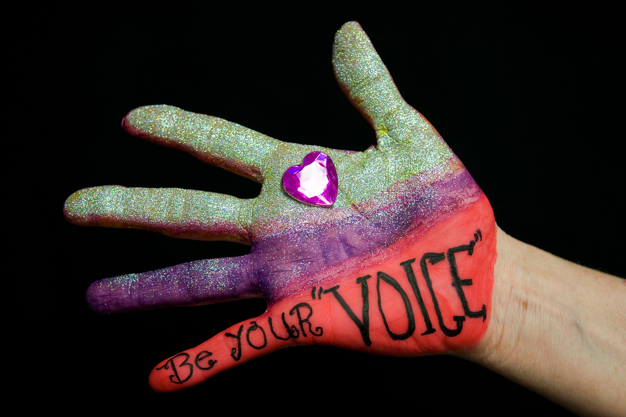 Jill Marconi, Airman and Family Readiness director at Grissom Air Reserve Base, Ind., displays her hand as part of an I Can project Oct. 17, 2013. Marconi, along with several other Grissom personnel participated in the event aimed at educating people on how they can take a stand against domestic violence. (U.S. Air Force photo/Tech. Sgt. Mark R. W. Orders-Woempner) 
