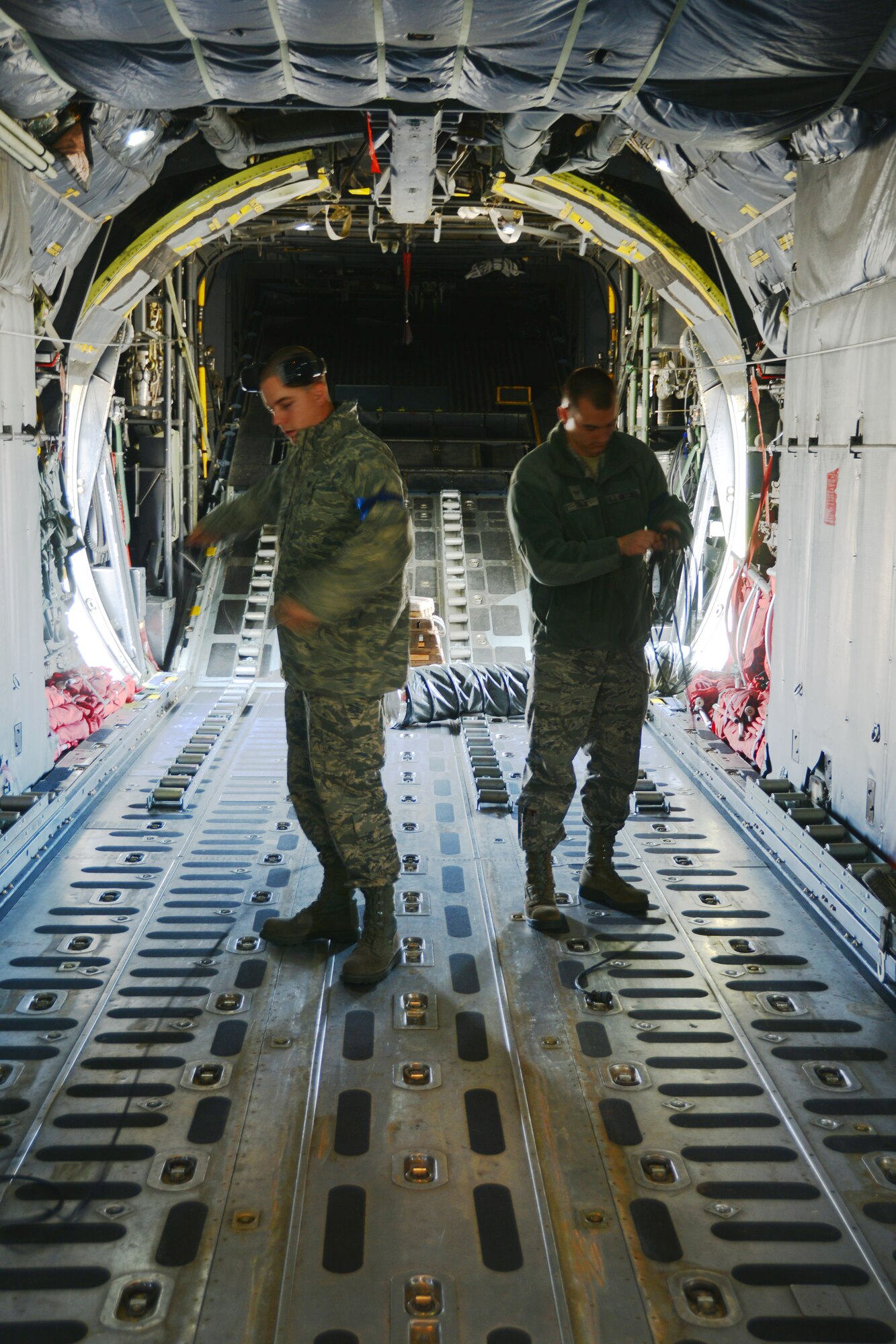 Staff Sergeant Ryan Sullivan and Senior Airman Zachery Savluck take part in maintenance training on a C-130H aircraft assigned to the 103rd Airlift Wing.  Instructors from the active duty Air Force are working together with counter parts from the Kentucky and Minnesota Air National Guard to form a temporary maintenance school house at the Bradley Air National Guard  Base, East Granby, Conn.  (U.S. Air National Guard photo by Senior Airman Jennifer Pierce)