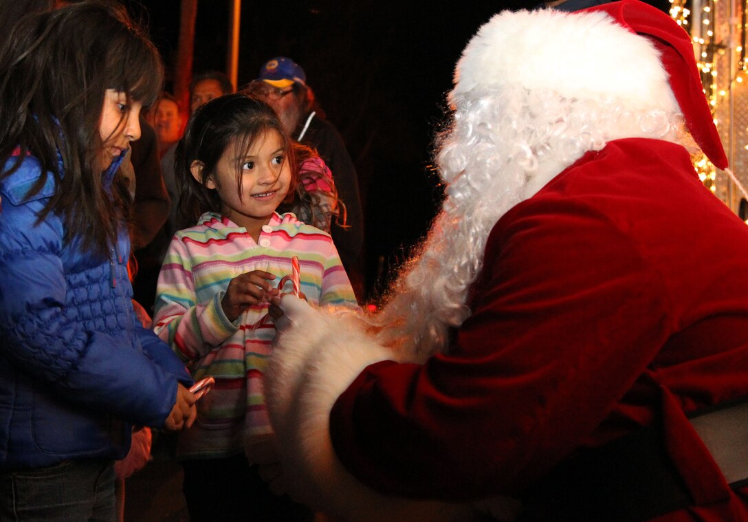 Santa Claus meets with local children during the 19th annual Twentynine Palms Winter Light Parade and tree lighting ceremony in Twentynine Palms, Calif. Dec. 3. While the parade normally is its own event, this year they combined with the Annual Tree Lighting Ceremony at City Hall to gather max participation.


