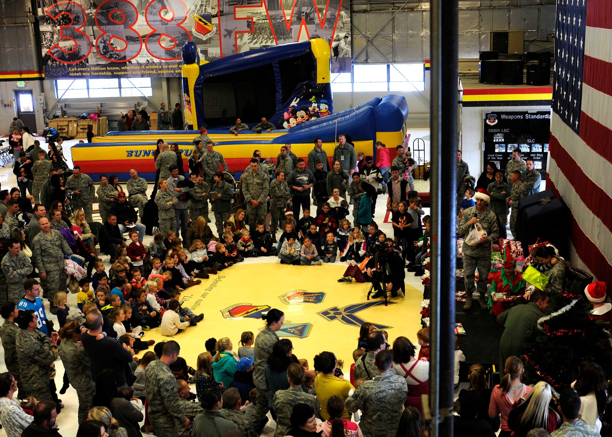 Friends and family of the 419th Fighter Wing attend a holiday party during the December unit training assembly. The children received presents and took pictures with Santa Claus. (U.S. Air Force photo /Senior Airman Allen Stokes)