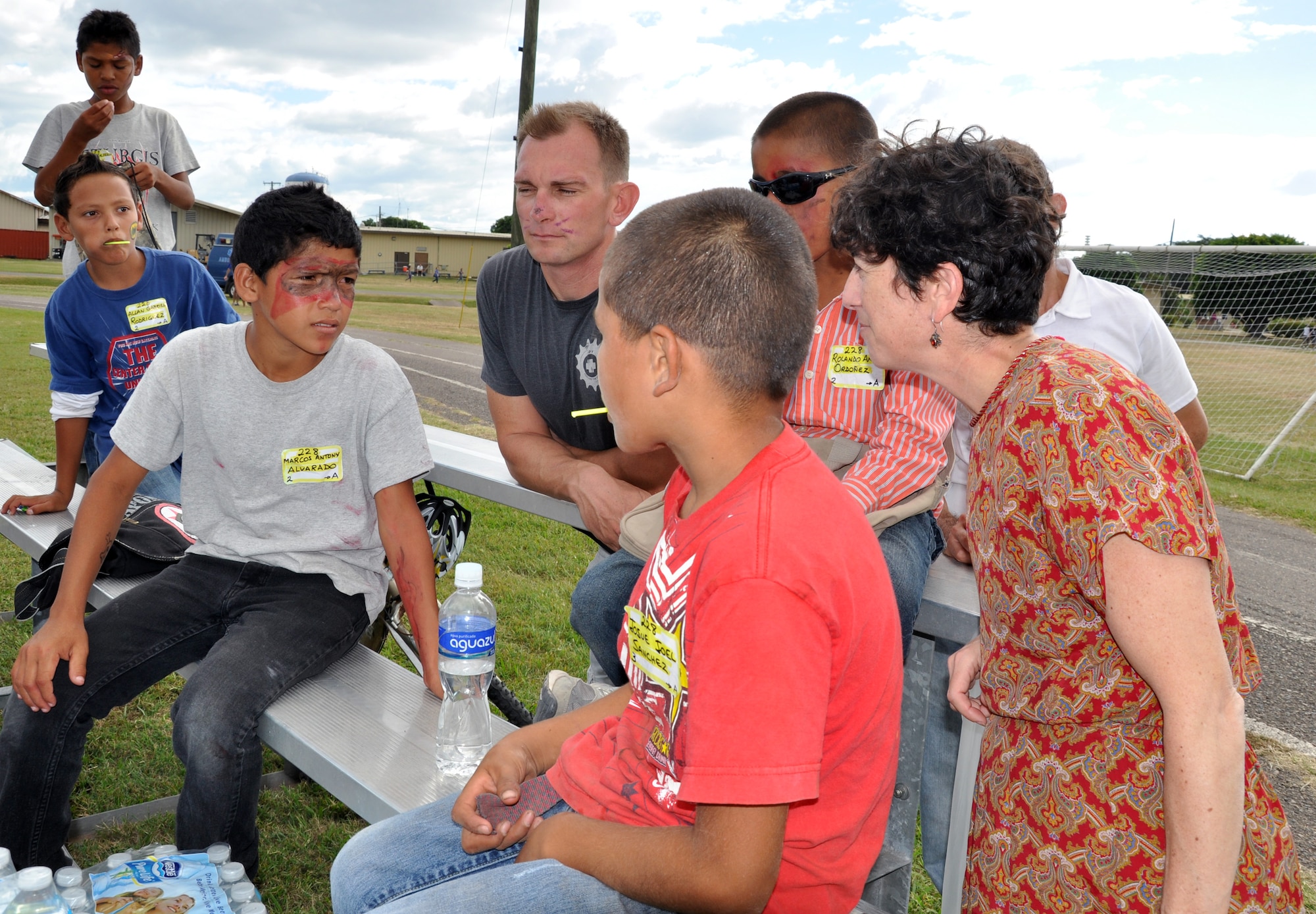 Julie Schechter Torres, Deputy Chief of Mission, U.S. Embassy, visits with Honduran orphans during Joint Task Force-Bravo's "Operation Holiday Blessing," at Soto Cano Air Base, Honduras, Dec. 6, 2013.  More than 300 Honduran orphans were treated to a day of activities, gifts, and holiday joy, provided by more than 200 volunteers from the Task Force.  (U.S. Air Force photo by Capt. Zach Anderson)