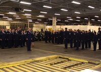 67th Aerial Port Squadron reservists stand in formation, awaiting inspection of their service uniforms. (Courtesy photo/Tech. Sgt. Rahman Badarane)