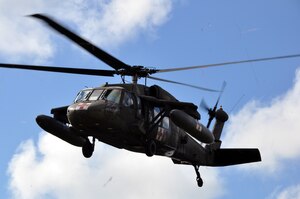 A UH-60 Blackhawk helicopter assigned to Joint Task Force-Bravo's 1-228th Aviation Regiment lifts off from Mocoron, Honduras, to conduct a medical evacuation (MEDEVAC) of a six-week old infant in the remote village of Auka, Dec. 3, 2013.  JTF-Bravo personnel successfully conducted the MEDEVAC to transport the infant to a medical care facility where the child received life-saving medical care.  (U.S. Air Force photo by Capt. Zach Anderson)