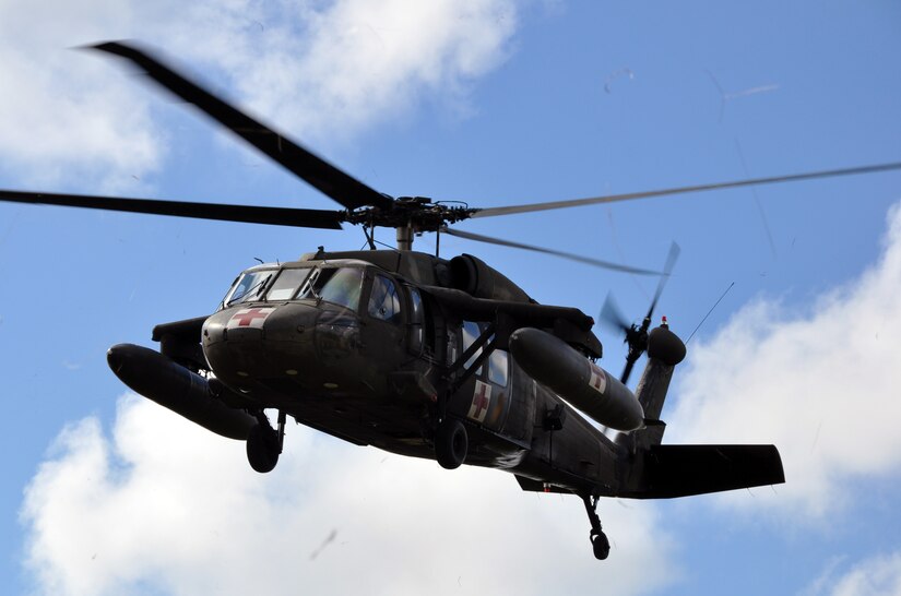 A UH-60 Blackhawk helicopter assigned to Joint Task Force-Bravo's 1-228th Aviation Regiment lifts off from Mocoron, Honduras, to conduct a medical evacuation (MEDEVAC) of a six-week old infant in the remote village of Auka, Dec. 3, 2013.  JTF-Bravo personnel successfully conducted the MEDEVAC to transport the infant to a medical care facility where the child received life-saving medical care.  (U.S. Air Force photo by Capt. Zach Anderson)
