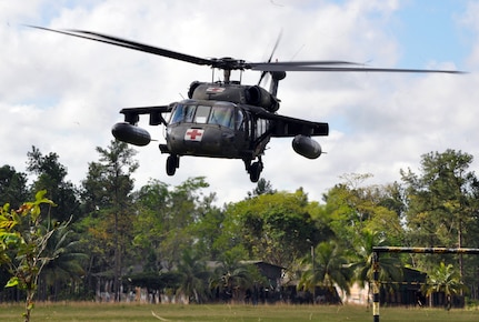 A UH-60 Blackhawk helicopter assigned to Joint Task Force-Bravo's 1-228th Aviation Regiment lifts off from Mocoron, Honduras, to conduct a medical evacuation (MEDEVAC) of a six-week old infant in the remote village of Auka, Dec. 3, 2013.  JTF-Bravo personnel successfully conducted the MEDEVAC to transport the infant to a medical care facility where the child received life-saving medical care.  (U.S. Air Force photo by Capt. Zach Anderson)