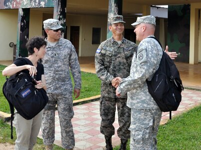 U.S. Army Col. Thomas Boccardi, Joint Task Force-Bravo Commander, and Julie Schechter Torres, Deputy Chief of Mission, U.S. Embassy, met with Lt. Col. Santos Colindres, Deputy Commander of the Honduran 5th Infantry Battalion, at Mocoron, Honduras, Dec. 3, 2013.  The leaders discussed several issues affecting the Gracias a Dios region of Honduras and how the U.S. and Honduras can work together to overcome challenges.  Boccardi and Torres then departed Mocoron to observe Joint Task Force-Bravo's Medical Element (MEDEL) performing a Medical Readiness Training Exercise (MEDRETE) in the remote village of Auka.  At Auka, Boccardi and Torres were able to interact with Honduran medical providers as well as meet with Marilyn Bentlez, Vice-Mayor of Puerto Lempira, Honduras.  (U.S. Air Force photo by Capt. Zach Anderson)