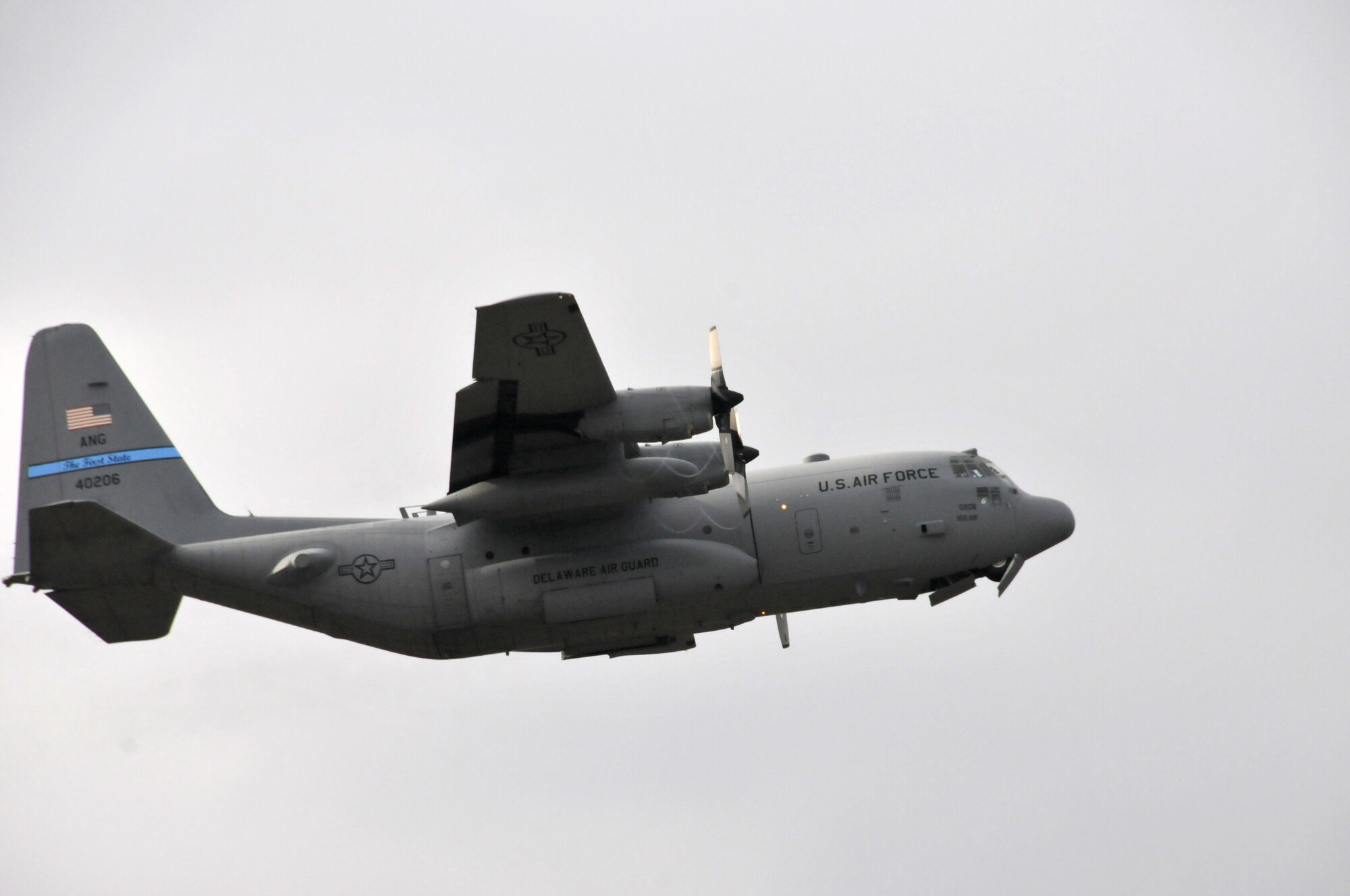 Delaware Air National Guard C-130 tail #40206 takes off from the New Castle ANG Base, Del., with seven aircrew members aboard to perform a local proficiency training mission on Dec. 7, 2013. This mission, along with another flight today, is recognized by the Delaware ANG to help celebrate the 166th Airlift Wing’s reaching the milestone of 175,000 safe flying hours without a serious mishap over the last 50 years. (U.S. Air National Guard photo by Tech. Sgt. Benjamin Matwey)